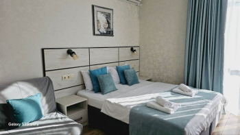 Делюкс с витражным окном и видом на море — фото 8