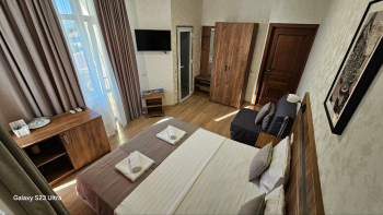 Делюкс с витражным окном и видом на море — фото 5