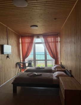 Двухместный номер с двумя односпальными кроватями 2 этаж — фото 1