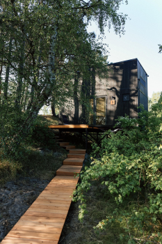 Большой Хитте с террасой и панорамным окном | красивый вид на дюны, сквозь которые частично видно море — фото 2