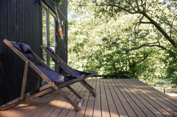 Большой Хитте с террасой и панорамным окном | красивый вид на дюны, сквозь которые частично видно море — фото 3